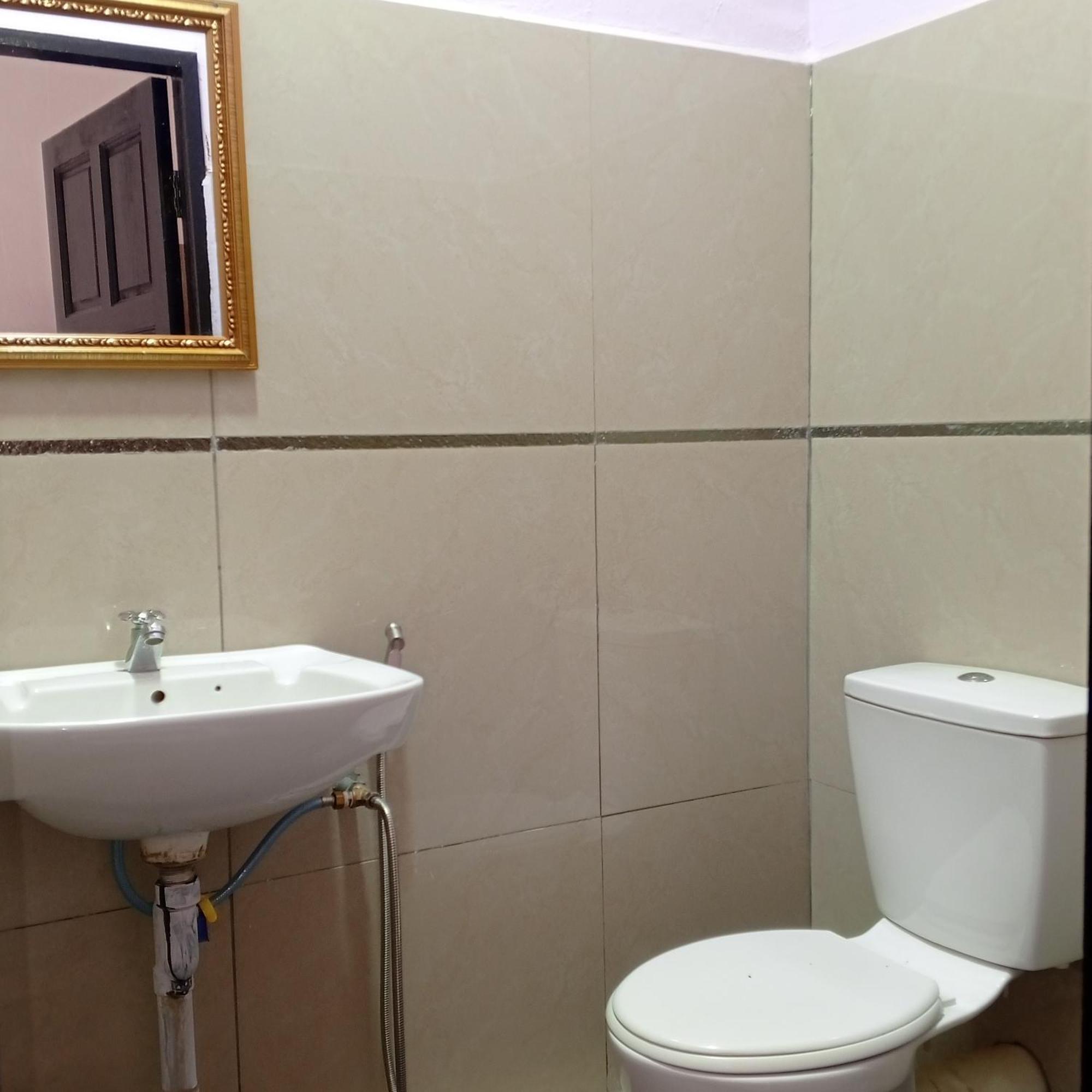 Sukau Tomanggong View Bed & Breakfast Bilik gambar